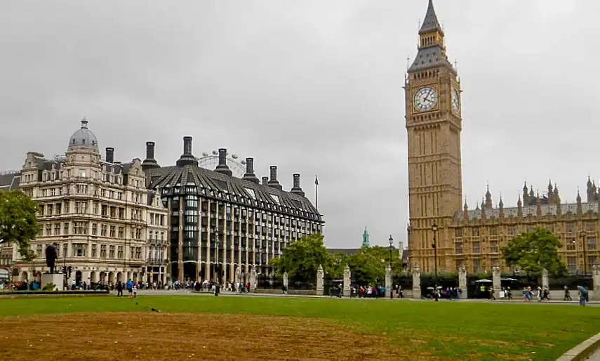 Big Ben and Portcullis House across Parliament Squar