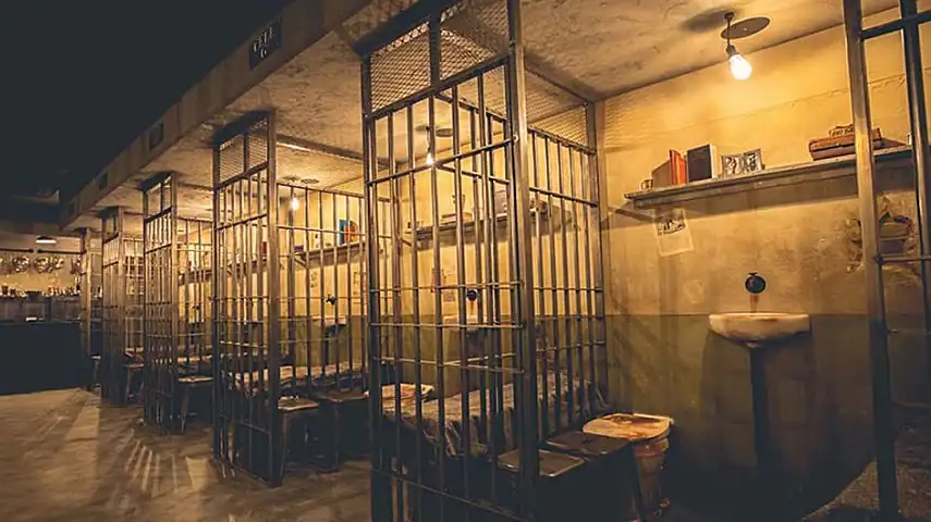 Prison cells inside the Alcotraz Prison Cocktail Bar