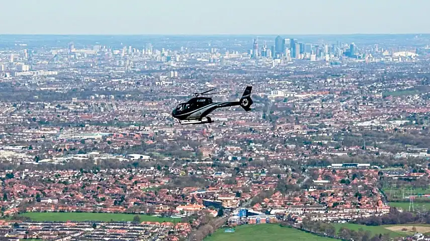 Airbus EC120 helicopter approaching central London