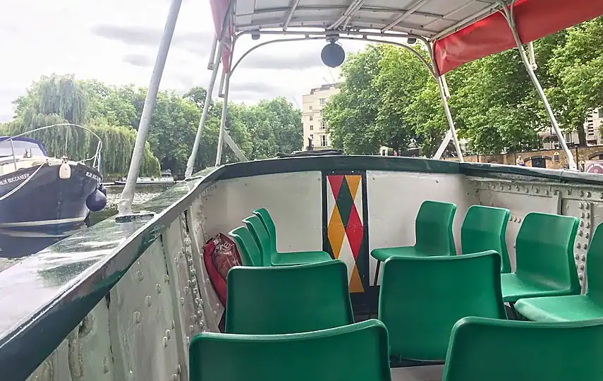 Plastic seats inside the canal boat