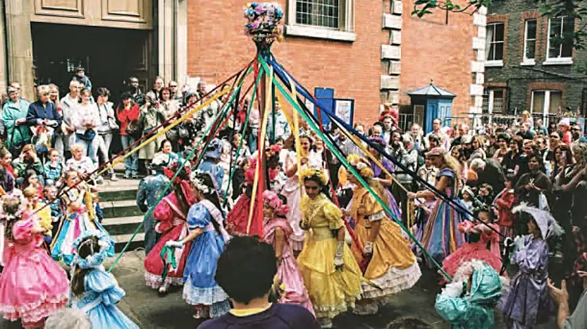 Maypole dancing in the garden of St. Paul's church