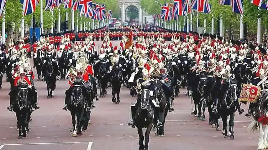 Soldiers parading down The Mall to the palace